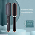 Hair straightener brush in use